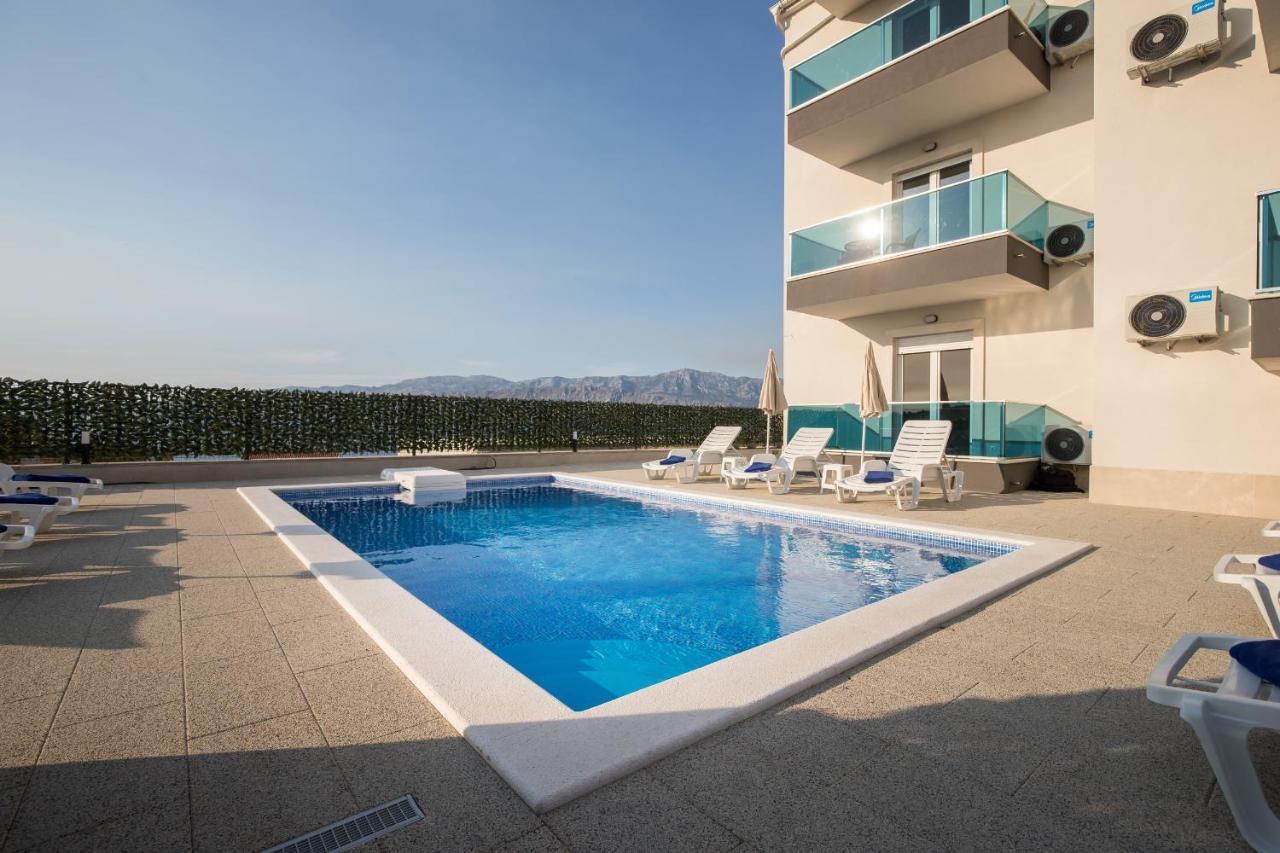 Apartments Blueview Postira Bagian luar foto